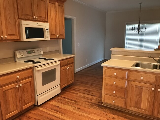 Photo - 4 bd 2 bth all brick w/ 2 car garage located on a 1 acre lot - lawn care, water, trash, washer/dr...