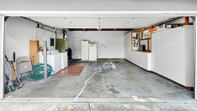 Photo - Light-Filled Home with Beautiful Garden & 2-Car Garage