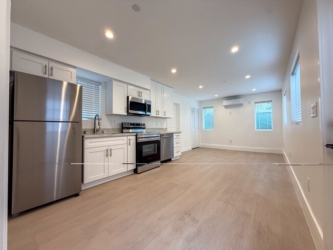 Building Photo - 6030 Colfax Ave Unit 1