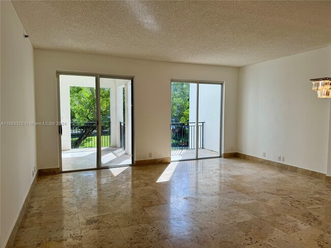 Building Photo - 3700 Island Blvd Unit C-202 Rental