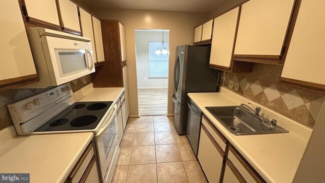 Building Photo - 7804 Guildberry Ct Unit 303