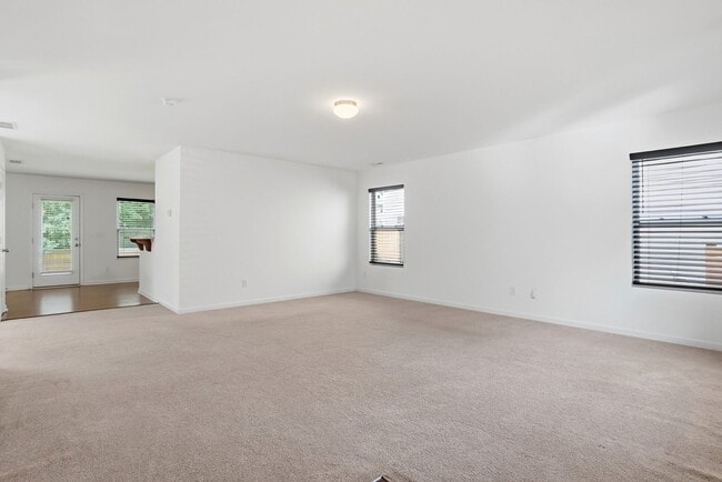 Photo - Spacious 4BR Home with New Carpet & Fenced Backyard