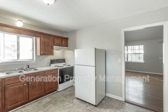 Building Photo - 4409 Delashmitt Rd Unit 4409-D