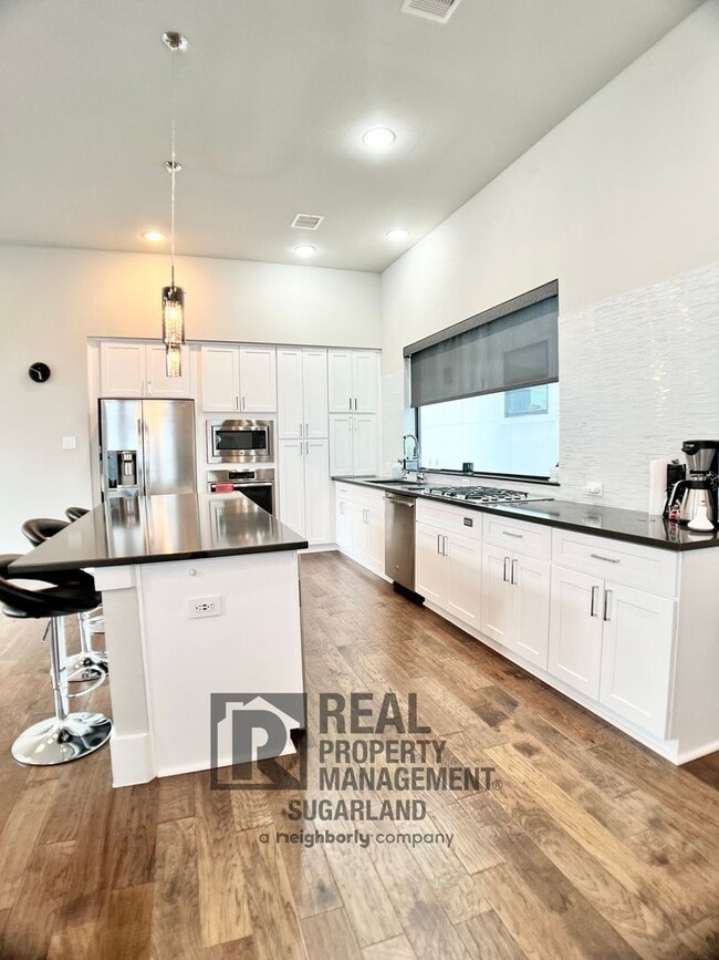 Photo - Luxurious Three Story Townhome!