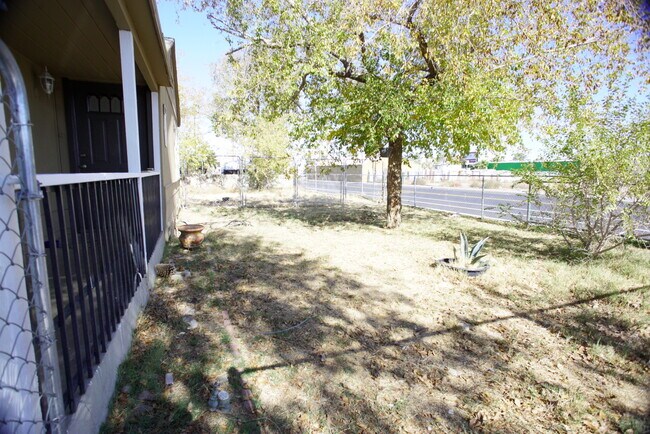 Large fenced front yard