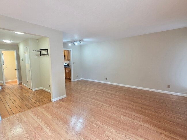Photo - Spacious 2BR Condo with Central A/C, Bonus Room & Huge Storage – Walk to Burlingame Avenue