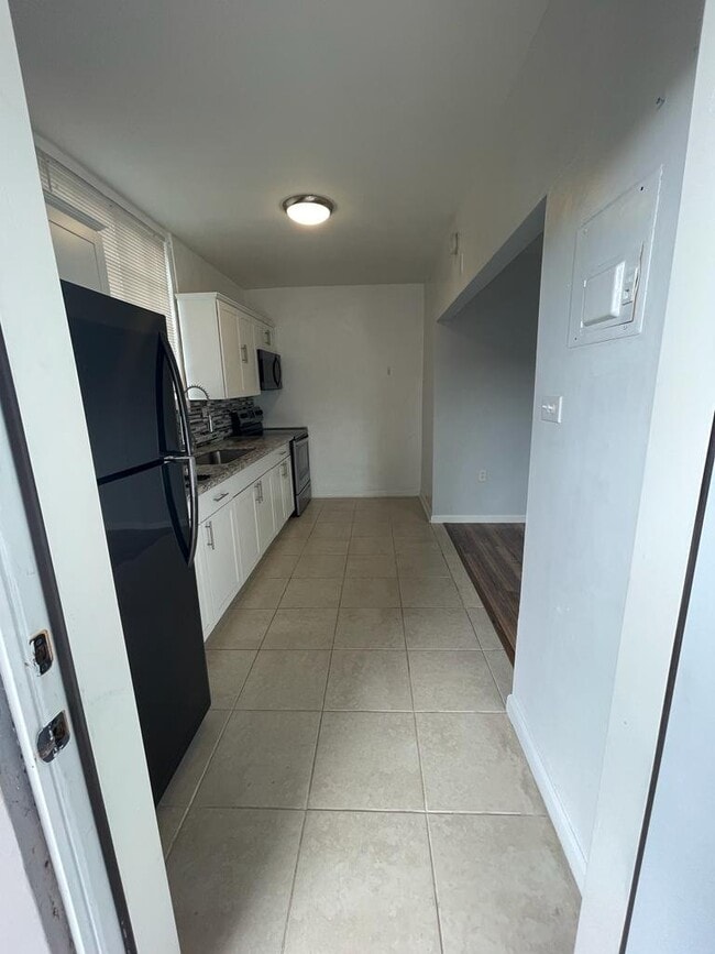 Photo - 112 SW 67th Ave Unit Back