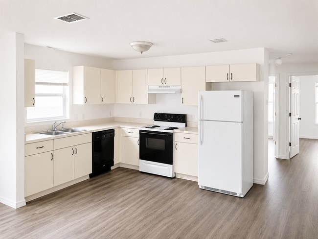 Photo - Spacious 2BR/1BA Duplex with Vaulted Ceilings & Wood-Style Flooring!