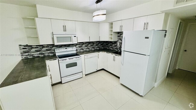 Building Photo - 1120 102nd St Unit 7 Rental