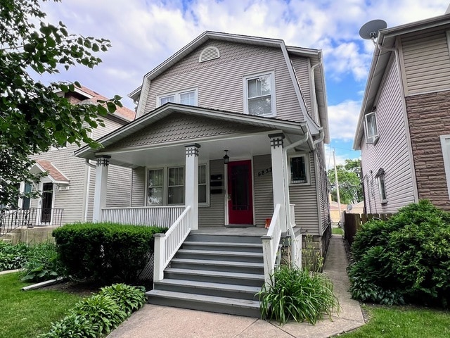 Building Photo - 5833 W Peterson Ave Unit 1