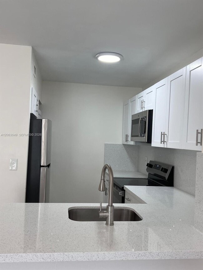 Photo - 2685 W 66th St Unit 12-20