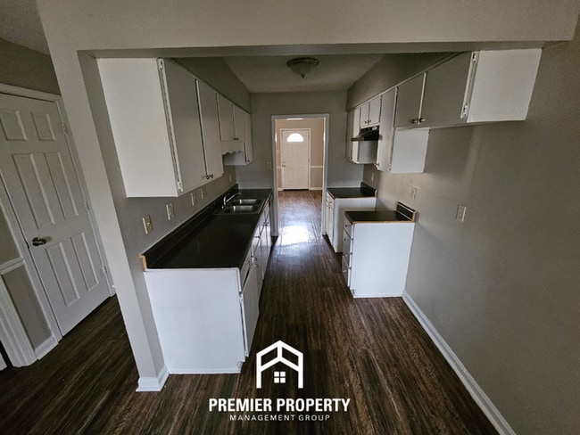 Photo - Charming 3-Bedroom Memphis Home with Vaulted Ceilings & Brick Fireplace