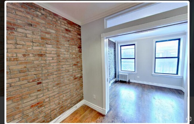 Building Photo - E. 10th st, Ave Rental