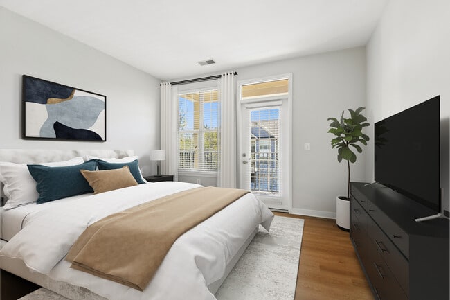 Renovated Package II bedroom with hard surface flooring