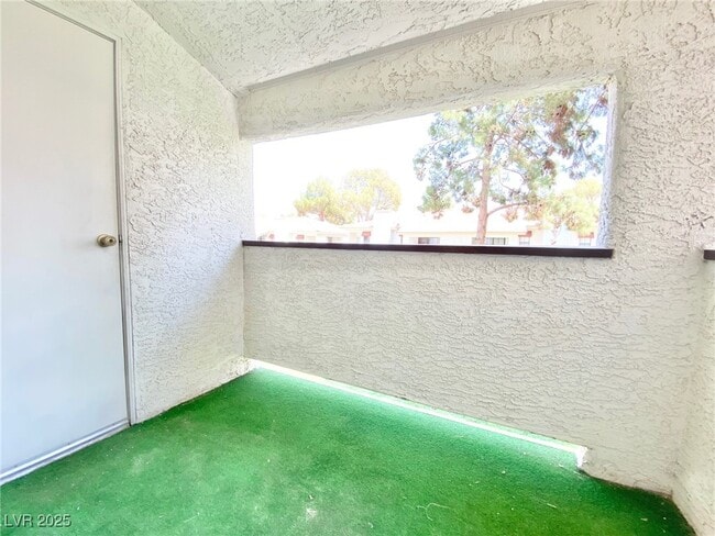 Building Photo - 6661 W Tropicana Ave Unit 203