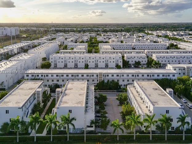 Building Photo - 6416 NW 102nd Ct Unit 303