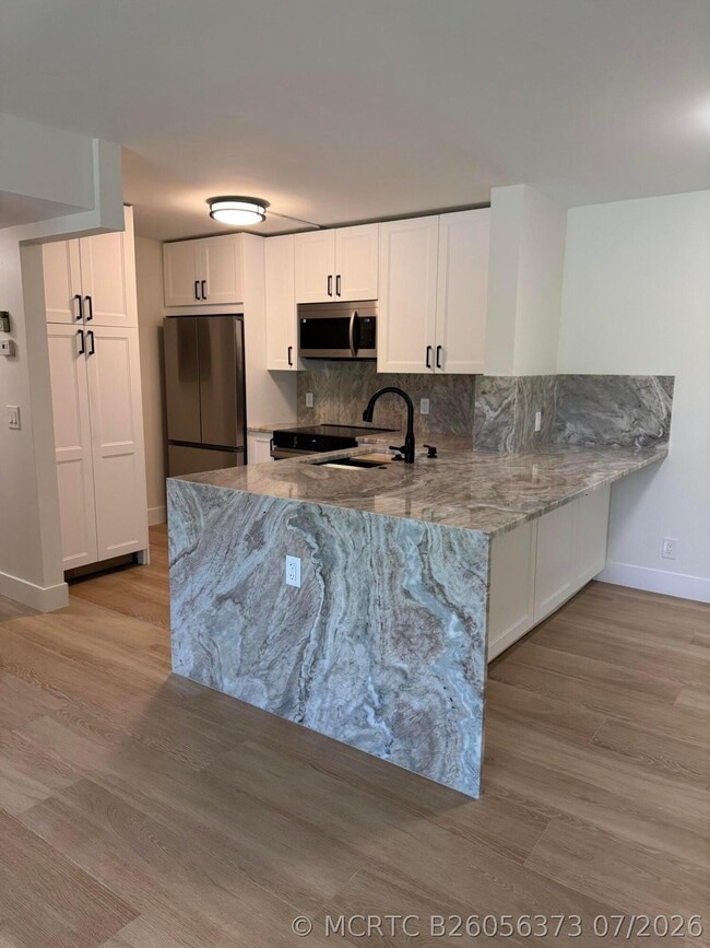 Building Photo - 629 Sea Pine Way Unit C1
