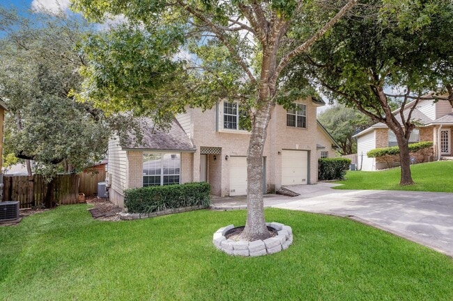 Photo - Modern Elegance: 3-Bedroom Townhome with Wood Flooring, Shaded Deck, and Inclusive Amenities