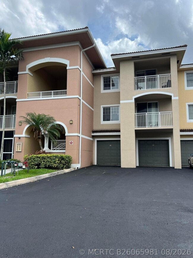 Building Photo - 6394 Emerald Dunes Dr Unit 202