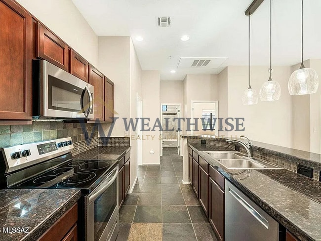 Photo - 2010 E River Rd Unit 202