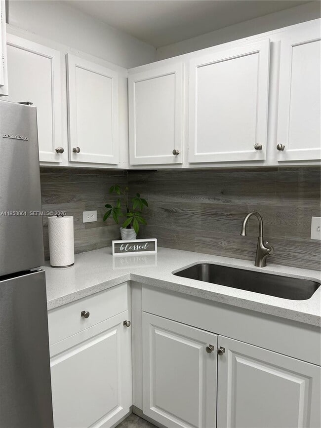 Photo - 3740 Inverrary Dr Unit 1U