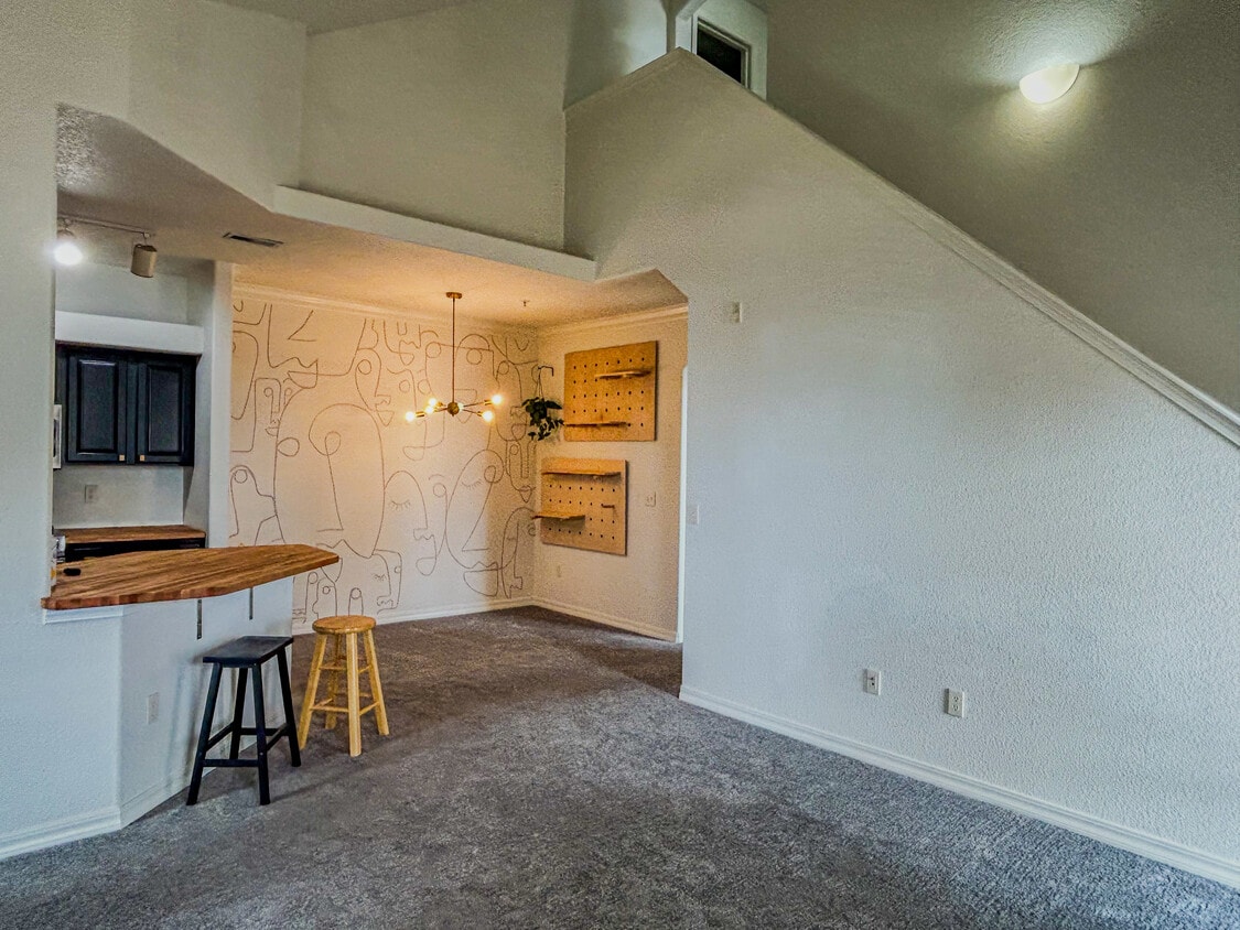 Living room looking into dining area and kitchen - 5378 Palomino Ranch Pt (Colorado Springs, CO)