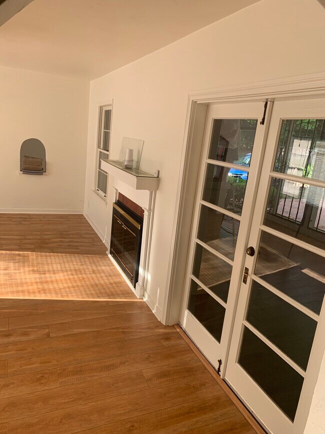 Fireplace and French doors - 3221 NW 14th St