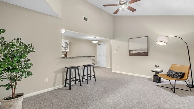 Relish into our spacious open-concept floor plans, offering large, versatile living rooms with a breakfast bar cut out for easy views into the kitchen – for elevated entertaining. - The Fairpointe at Gulf Breeze