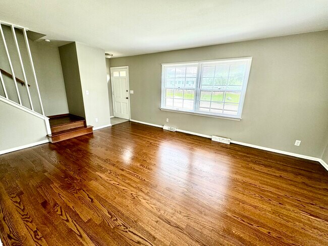 Leaving Room w/ Freshly refinished hardwood floors