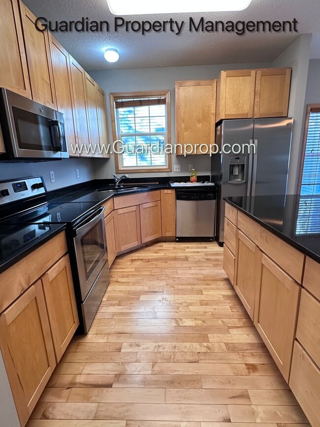 Photo - Hopkins Single Family Home, 2 Car Garage, Office, Gas Fireplace, Primary Suite