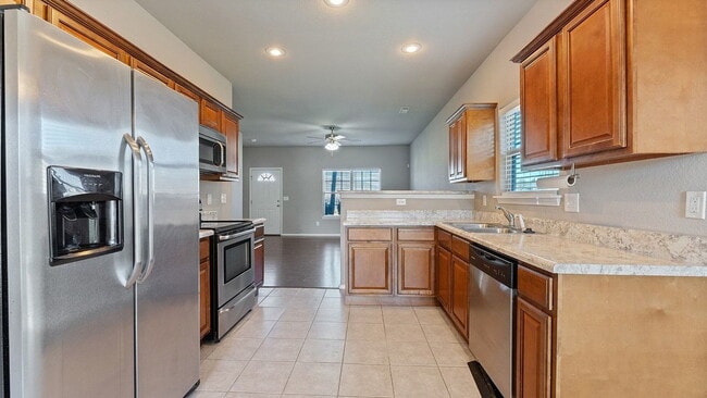 Photo - Spacious 4-Bedroom with Elegant Granite Finishes