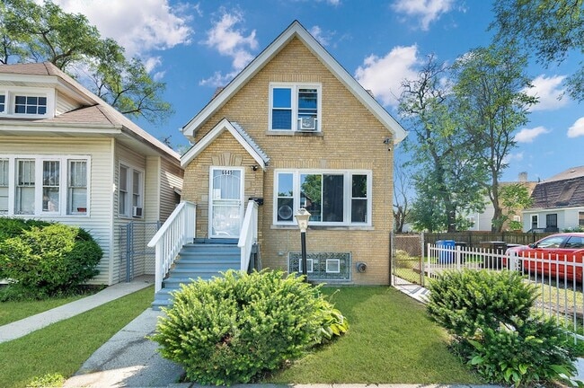 Building Photo - 6645 S Seeley Ave Unit 2