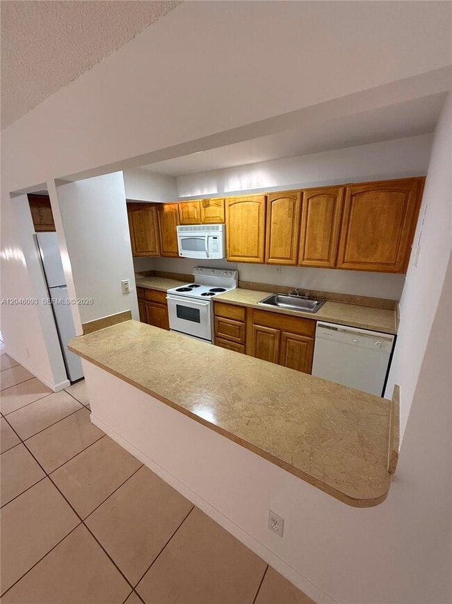 Building Photo - 455 S Pine Island Rd Unit 306C