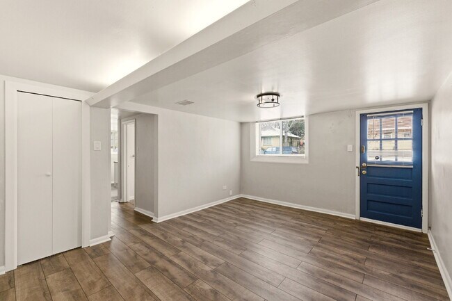 Photo - Renovated studio with garage + utilities included! Modern kitchen with island, updated bath, on-s...