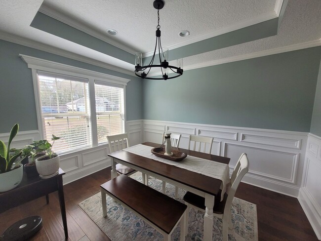 Photo - Exquisite Southern Living: 3BR/2BA Gem with Modern Touches, Fenced Yard, and Community Pool in Be...