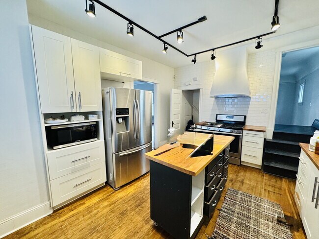 Photo - "Spacious 6-Bedroom Gem with Gleaming New Hardwood Floors in Minneapolis!"
