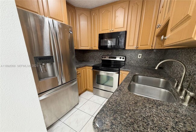 Building Photo - 2565 W 56th St Unit 101