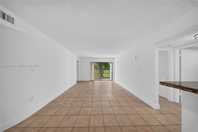 Building Photo - 7195 NW 179th St Unit 109