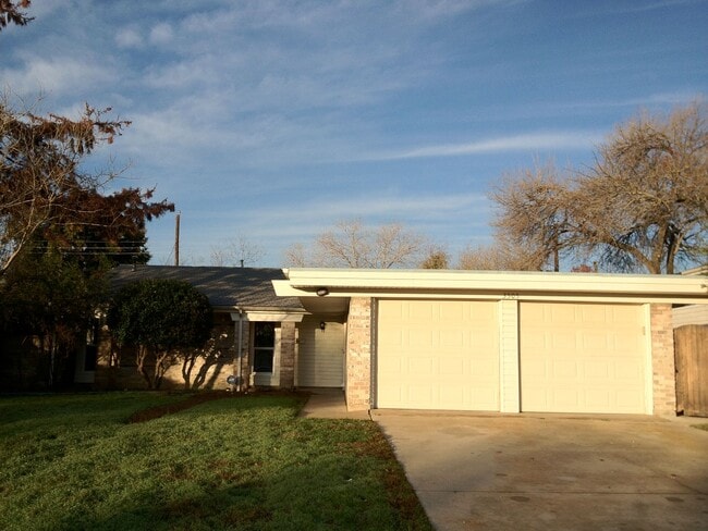 Photo - 3 Bed, 2 Bath. Hardwood floors, quartz countertops, stainless steel appliances.