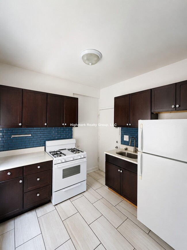 Building Photo - 6345 N Magnolia Ave Unit 3OC