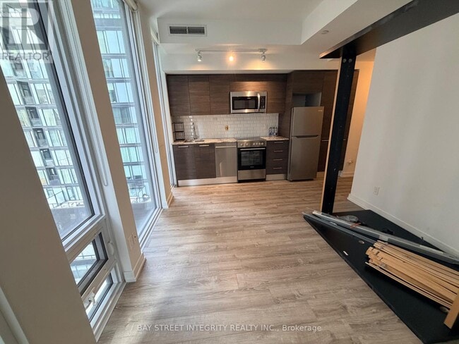 Photo - 28 Wellesley St E Unité 710