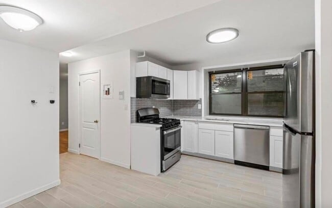 Building Photo - 427 John F. Kennedy Blvd Unit 1B