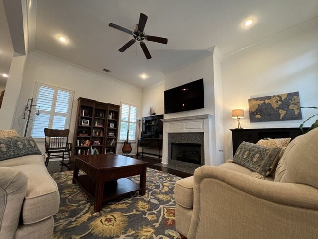 Photo - Luxury 4BR Home in Americana | 11 Ft Ceilings, Courtyard Living & Furnished Option