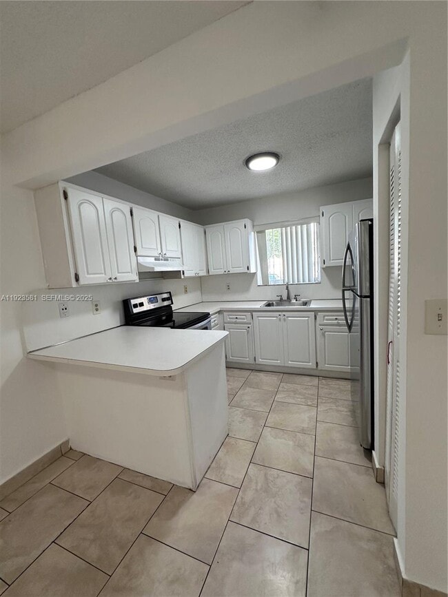 Photo - 7935 W 30th Ct Unit 108