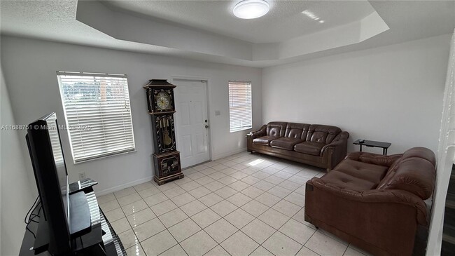 Photo - 10589 SW 6th St Townhome