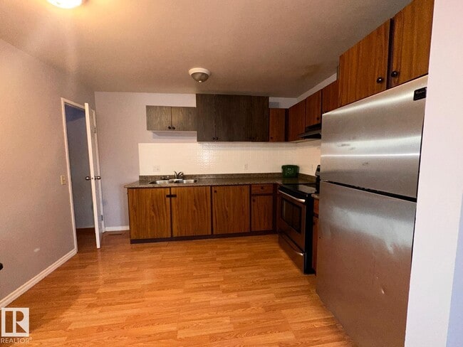Photo - 2114-2152 52 St NW