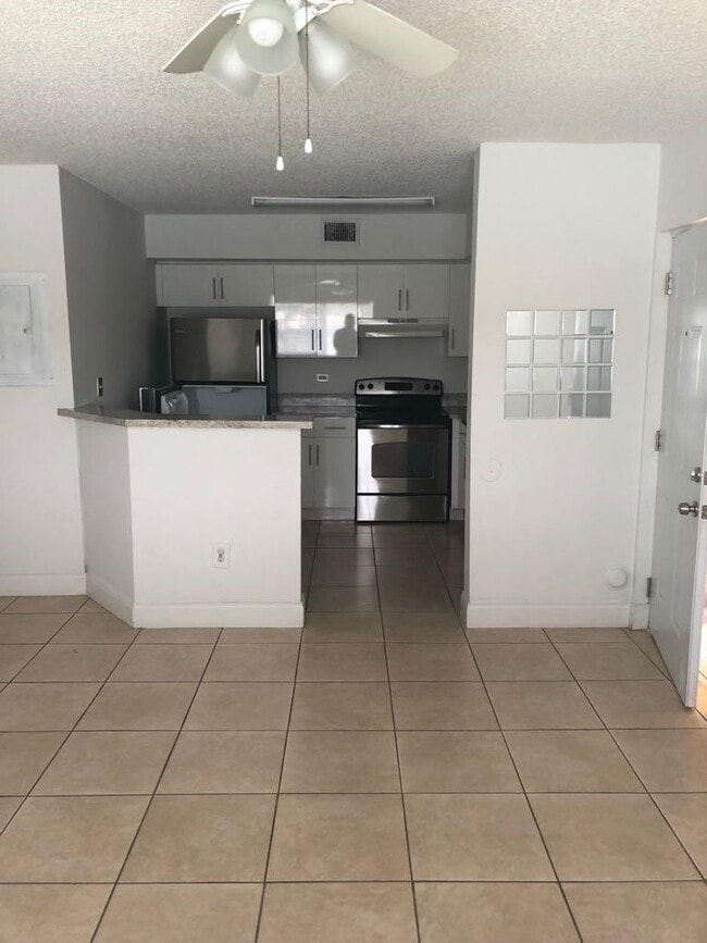Building Photo - 3610 N 56th Ave Unit 210
