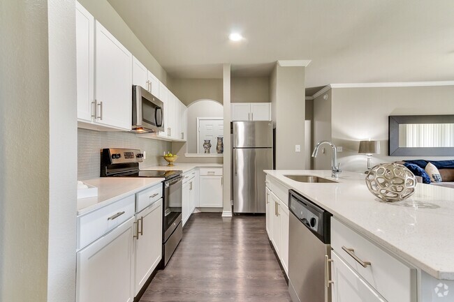 Our chef inspired kitchens feature stainless steel appliances. - Windsor at Legacy Rental