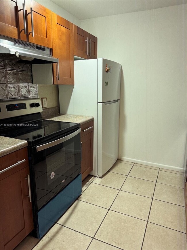 Building Photo - 13550 SW 6th Ct Unit 409A