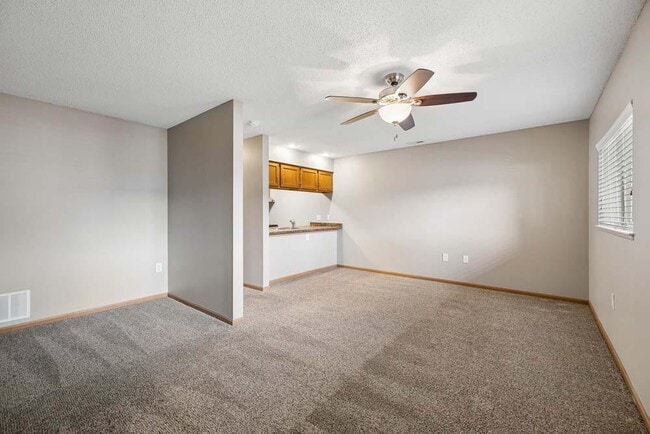 With an open layout and generous living space, this inviting room offers the flexibility to relax, entertain, or make it entirely your own.
